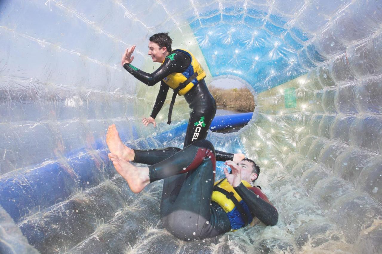 Retallack Resort & Spa Падстоу Екстер'єр фото Two people inside a water ball